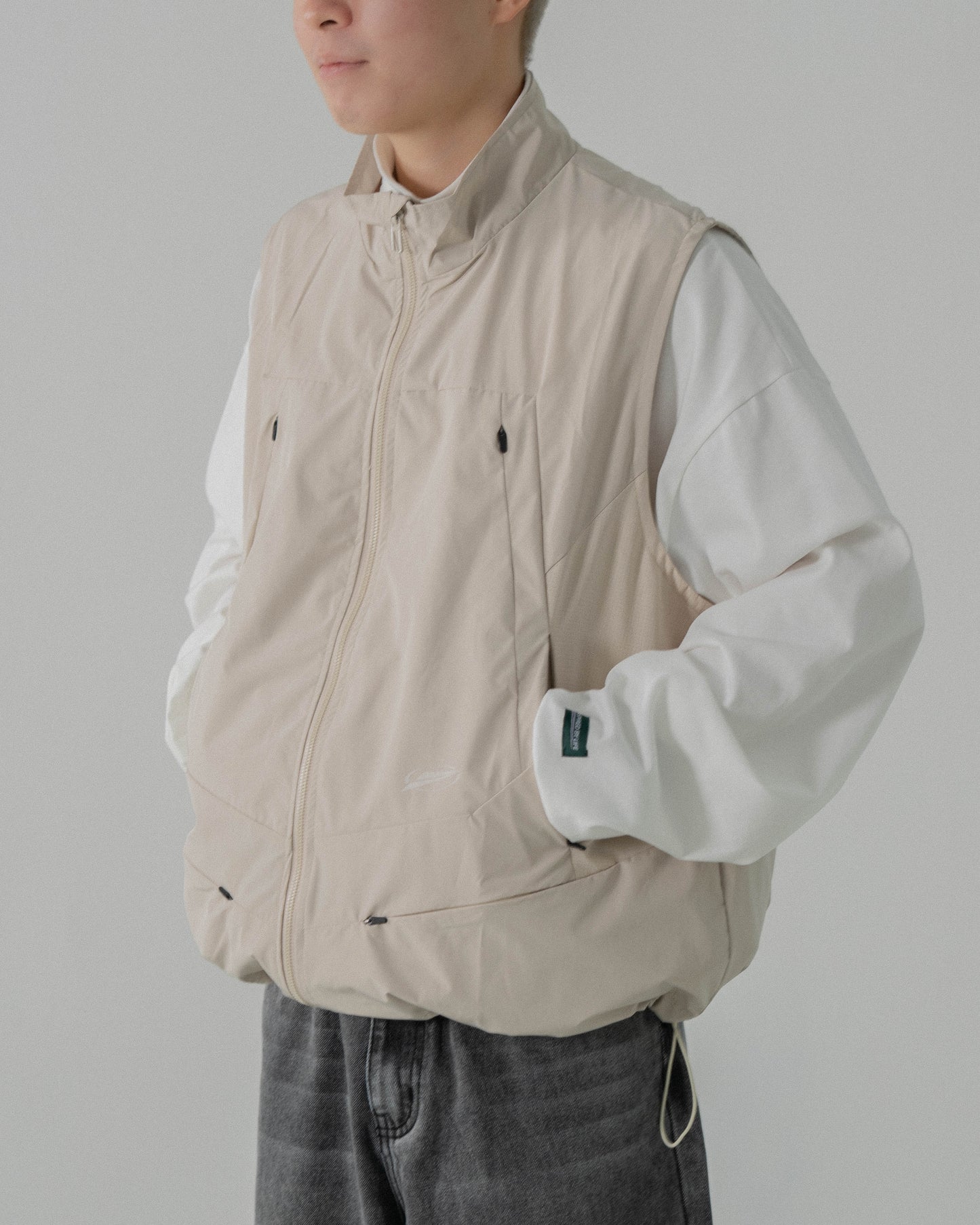 
                  
                    Tech Track Vest Cream【M23-43CM】
                  
                