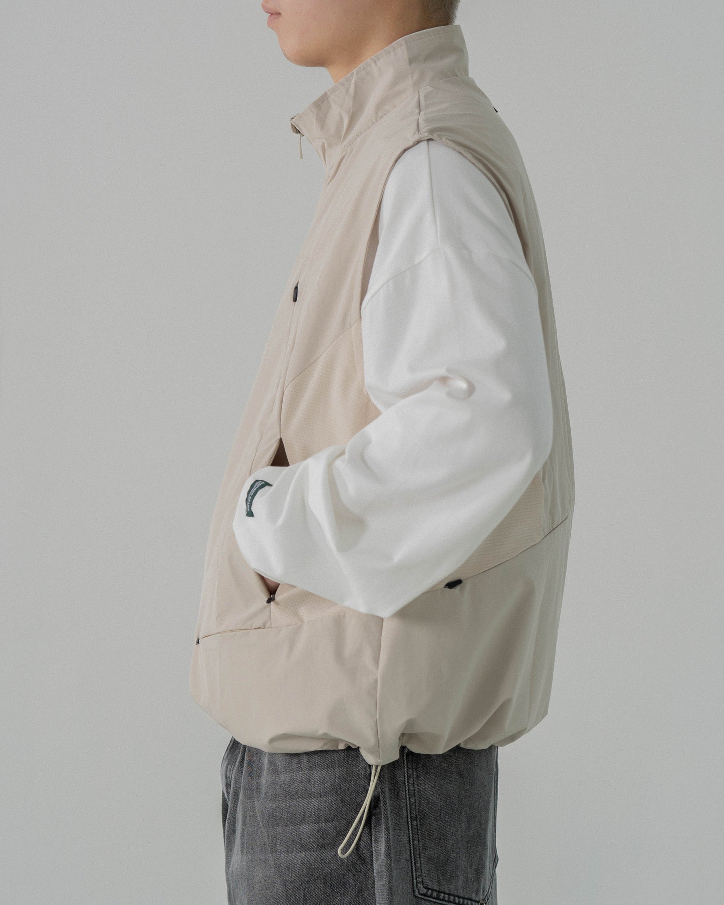 
                  
                    Tech Track Vest Cream【M23-43CM】
                  
                