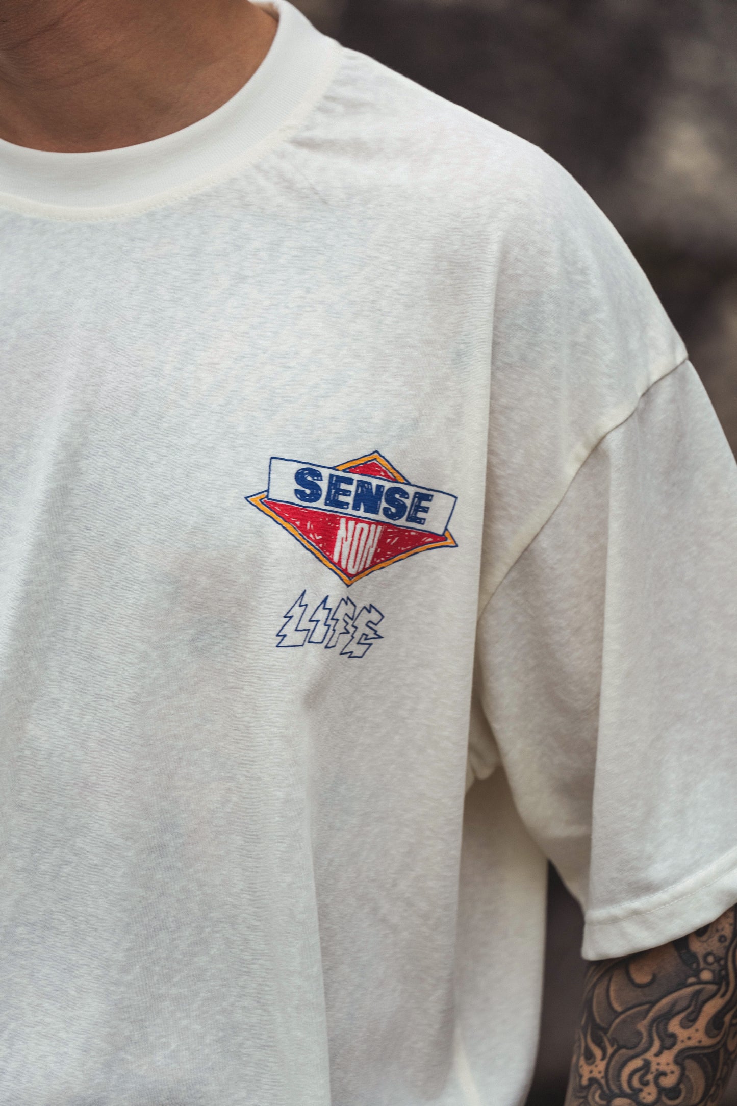 
                  
                    Motor-Graphic Varsity Tee Cream【Nonsense-T02CM】
                  
                